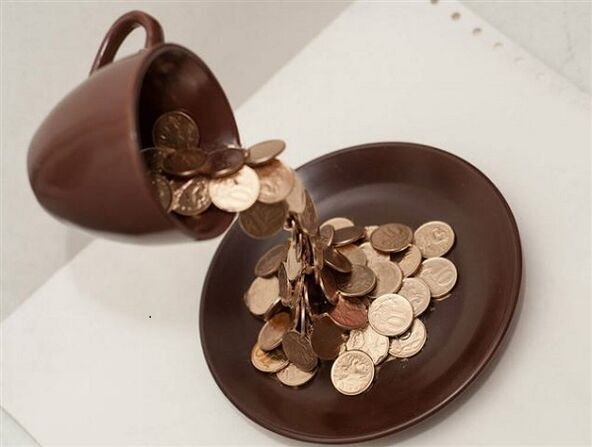 a bowl of coins to attract money
