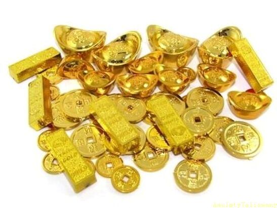 gold bars and coins as amulets of happiness